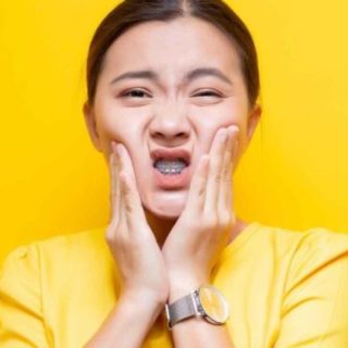 Does Braces Treatment Hurt? 3 Orthodontic headgear Jumeirah