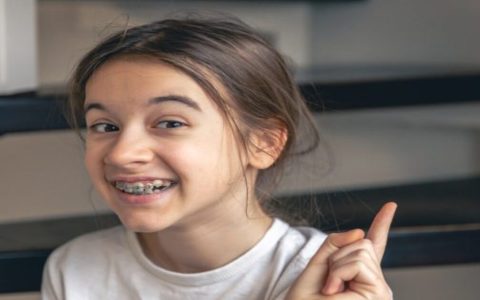 At what age should orthodontic treatment begin?